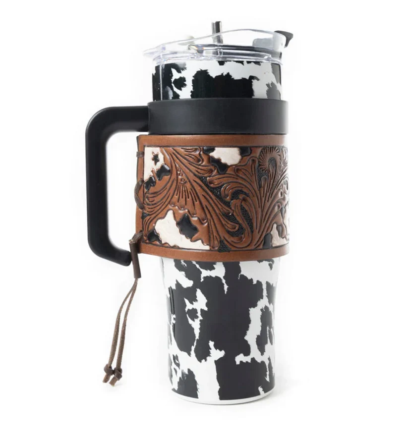 Copo térmico estilo faroeste com estampa de vaca